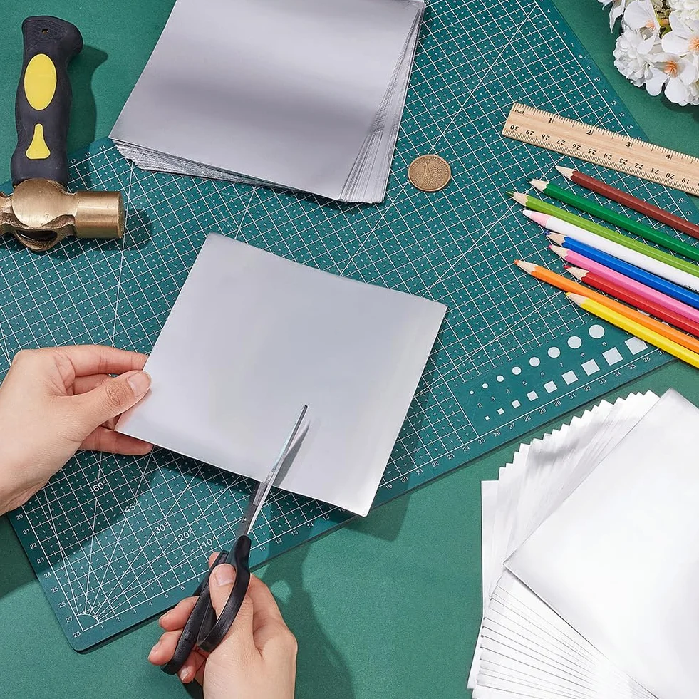 OLYCRAFT 100 hojas lámina de aluminio metal 15x15 cm 0,1 mm doble cara plateada para manualidades