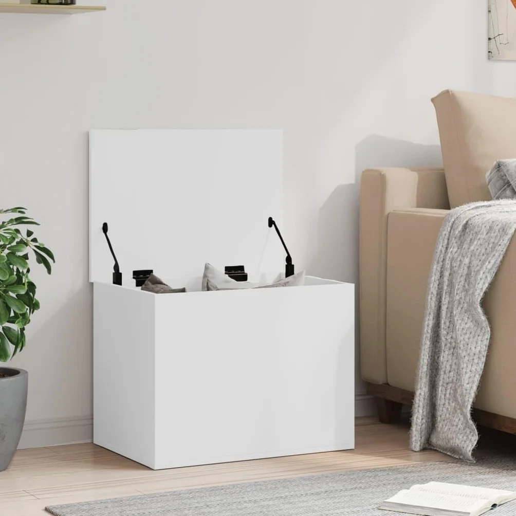 Baúl almacenaje blanco 60 cm, madera ingeniería resistente humedad. Amplio espacio ropa, mantas, juguetes. Tapa con elevación gas, uso como mesa centro. Fácil montaje, carga 125 kg. Versátil salón, do