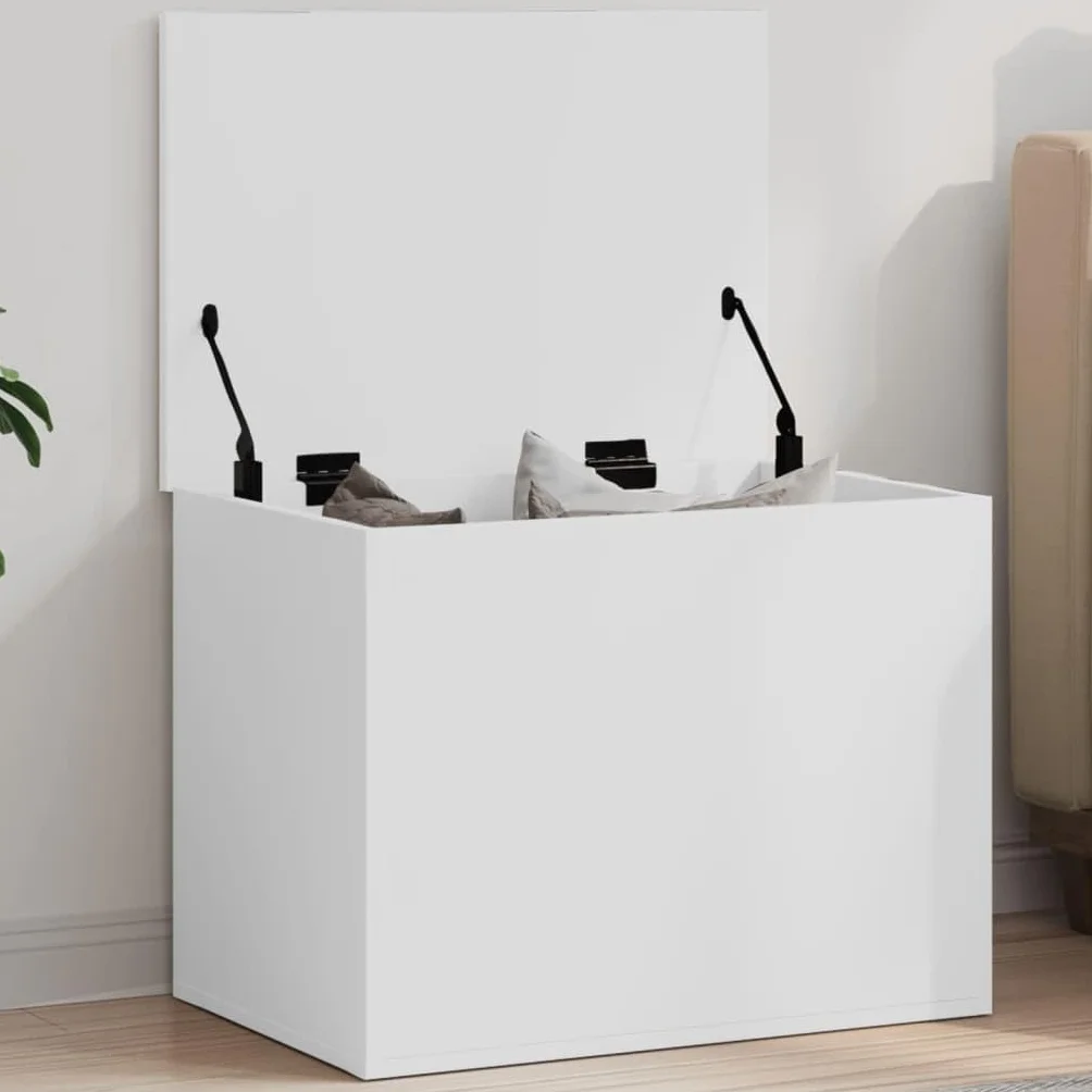 Baúl almacenaje blanco 60 cm, madera ingeniería resistente humedad. Amplio espacio ropa, mantas, juguetes. Tapa con elevación gas, uso como mesa centro. Fácil montaje, carga 125 kg. Versátil salón, do